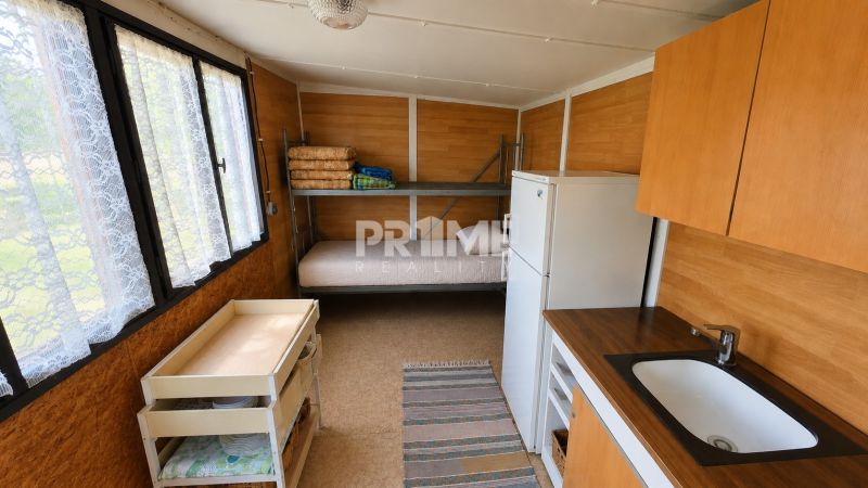 Slnečný rekreačný pozemok 521 m² s chatkou,Nové Košariská